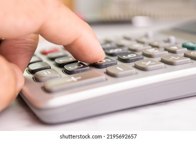 Close Up Human Finger Push Number Button Of Calculator Concept Calculation Of Income, Expenditure, Calculation