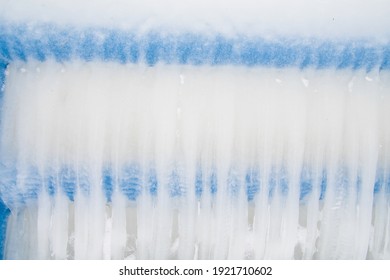 Close Up Of Ice Build Up On Blue Railing