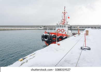 
Close Up Of  Icebreaker, A Ship Designed For Breaking A Channel Through Ice. Icebreaker Ship Going Through The Ice Fields. Boats That Bring Tourists To The Sea. In The Winter Of Hokkaido, Japan.