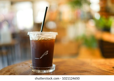 Close Up Iced Americano With Blur Interior Cafe Background