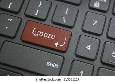 Close Up Of Ignore Button On Computer Keyboard