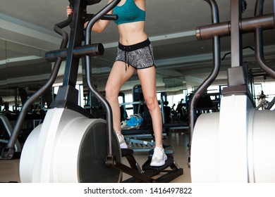 Close up image of attractive fit woman in gym - Shutterstock ID 1416497822