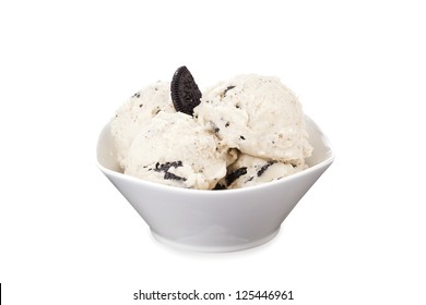 Close Up Image Of Bowl Of Cookies And Cream Ice Cream Against White Background