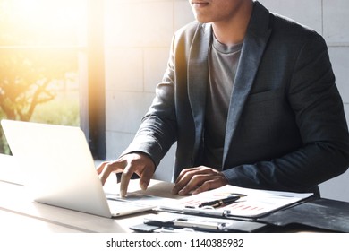 Close Up Image Of Businessman Find Information Through The Internet To The Presentation.
