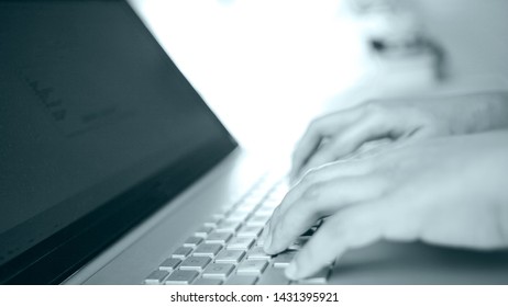 Close up image of businessman hands typing on notebook, copy writer, working on laptop computer