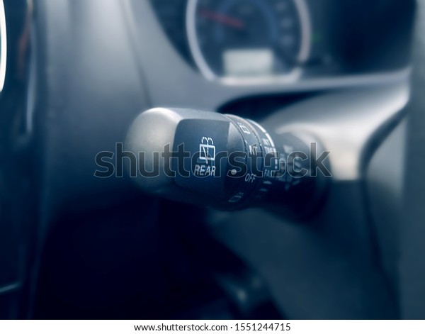 Close up image of car wiper control knob, car\
interior, wiper adjuster