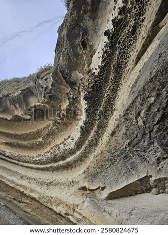 Close up image of Coastal cliffs on the west coast of the south island in New zealand. Dramatic cliffs with major ersoion. Rock forms downunder. Image of steep coastal cliffs eroding rapidly