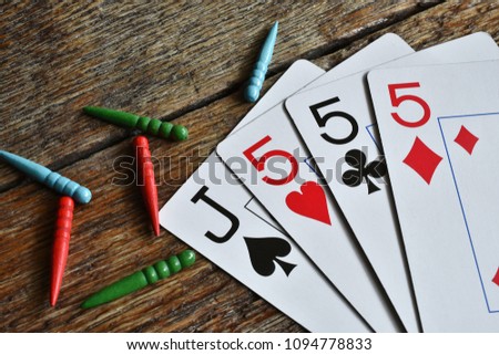 A close up image of a cribbage game. 