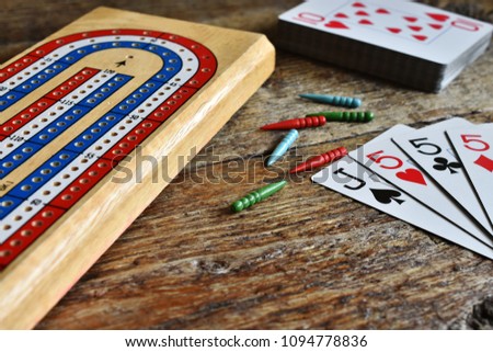 A close up image of a cribbage game. 