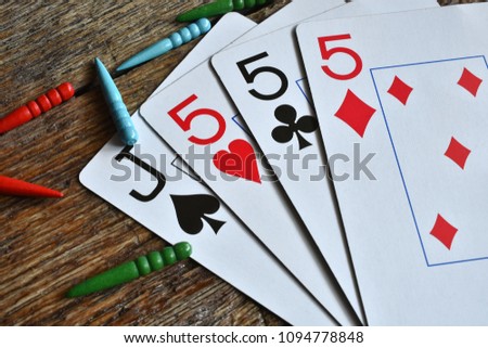 A close up image of a cribbage game. 