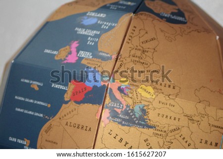Close up image of Europe on a world globe made from cardboard