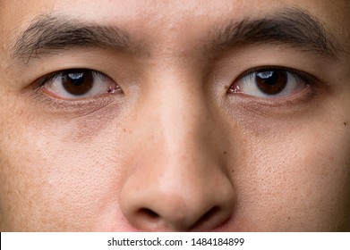 The Close Up Image Of The Eyes Of Asian Man. The Concept Of Modern Life, Technology, Iris Scanner And Internet Of Things