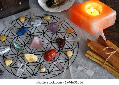 A close up image of a healing chakra grid on a sacred geometry grid cloth.