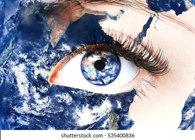 Close up image of human eye with earth in it. Elements of this image furnished by NASA