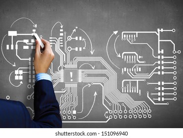 Close up image human hand drawing circuit board