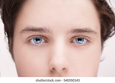 Close Up Image Of Insightful Look Blue Human Eyes