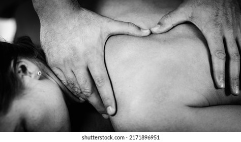 Close Up Image Of Physical Therapist Massaging Female Client’s Shoulder.