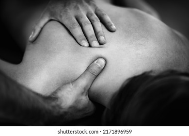 Close Up Image Of Physical Therapist Massaging Female Client’s Shoulder.