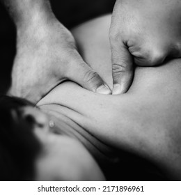 Close Up Image Of Physical Therapist Massaging Female Client’s Shoulder.