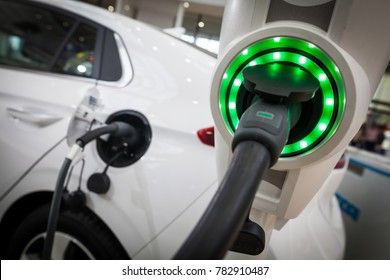 Close up image of the power socket of an electric car, charging. - Shutterstock ID 782910487