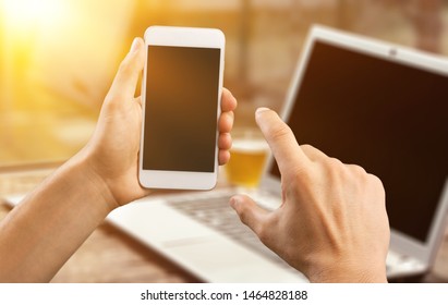Close up image of smart phone mockup, businessman holding phone with white screen template - Shutterstock ID 1464828188
