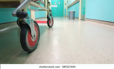 Close up image of stretcher's wheel in the hospital corridor
