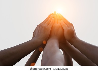 Close Up Image Of Successful Team Join Group Of Hands Up   For Achievement Target ,collaboration And Close Relationship On Isolated White Background, Sun Light ,teamwork Concept,