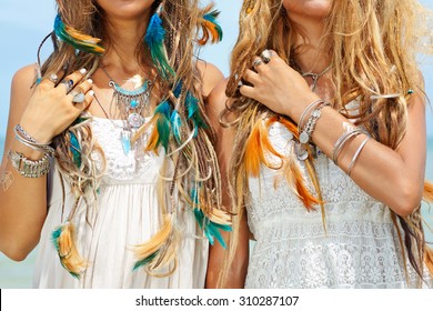 close up image of two hippie girls. boho style