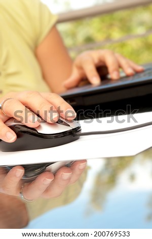 Close up image of woman  using computer 