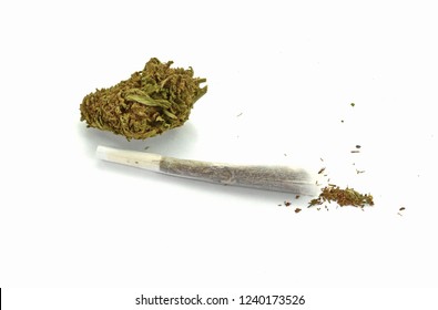 Close up of indica prescription and recreational medical marijuana flower bud  and joint isolated on white background. Medical marijuana.Therapeutic and medicinal cannabis. Marijuana nugget.