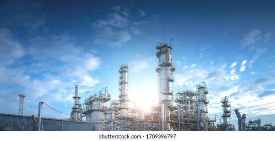 Close Up Industrial View At Oil Refinery Plant Form Industry Zone With Sunrise And Cloudy Sky