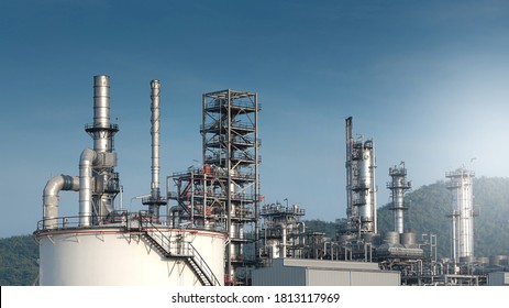 Close Up Industrial View At Oil Refinery Plant Form Industry Zone With Sunrise And Cloudy Sky