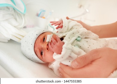 Close Up Of An Infant With Nose Feeding Tube, ICU