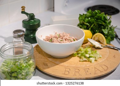 Close Up Of Ingredients For Making Tuna Salad For A Sandwich Or Salad, Blurred Kitchen Background.