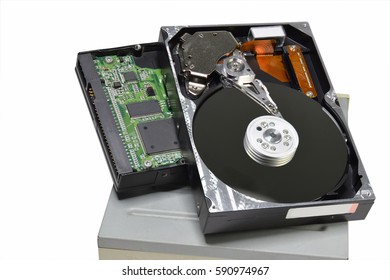 Close up inside of Hard disk drive On white background.