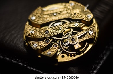 Close up inside mechanical vintage watch. Handmade engraving. Concept eternity, teamwork. Soft focus. Free space for text. Macro. Conceptual photo for your successful business design.