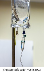 Close Up Of Intravenous Bag On Drip Stand In Hospital Ward.