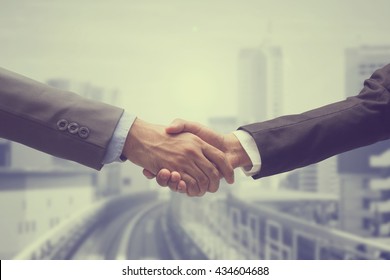 Close Up Investor Businessman Handshake With Partner Vendor,collaboration Of Two Ceo Leader Hand Shake For Agreement Concept.