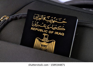 Close Up Of Iraqi Passport In Black Suitcase Pocket 