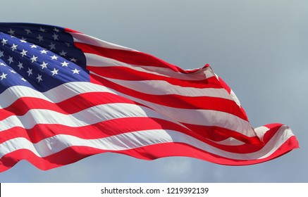 Close Up Isolated Colorful Waving Rippled United States Of American U.S. Flag With Stars And Stripes Red White And Blue 