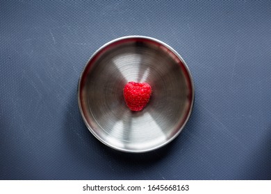 close up of an isolated raspberry in studio