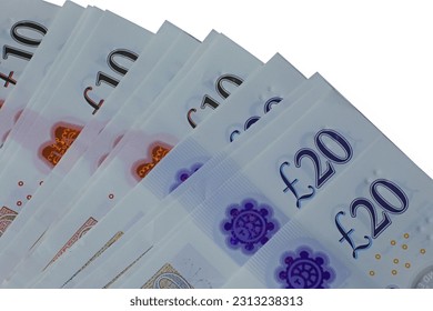 Close up isolated spread of ten and twenty pound notes.