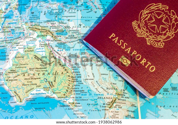 Close up of\
Italian passport with Australian\
map