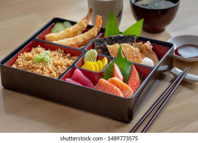 Close Up Of Japanese Lunch Box, Bento Box Set. Salmon, Wasabi, Fish, Shrimp