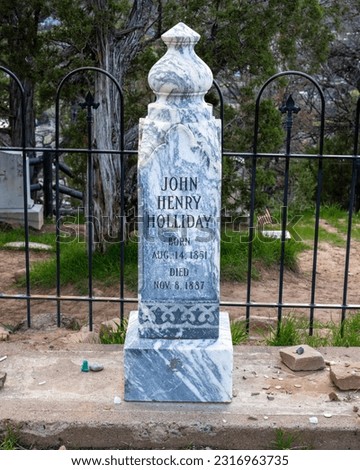 Close up of John “Doc” Henry Holliday’s granite memorial marker in Linwood Cemetery, Glenwood Springs Colorado
