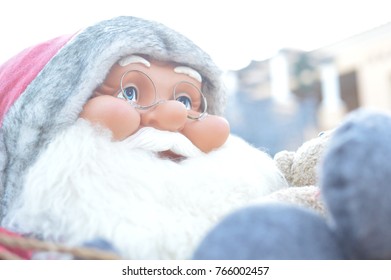 Close up of joyful traditional Santa Claus - icon of the happy festive time, seasonal outdoors background. Jolly portrait photo - Powered by Shutterstock