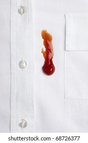 Close Up Of Ketchup Stain On White Shirt