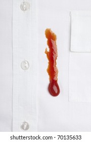 Close Up Of Ketchup Stain On White Shirt