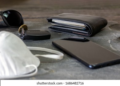 Close Up Of Keys, Wallet, Phone And Face Mask, Modern Day Essentials