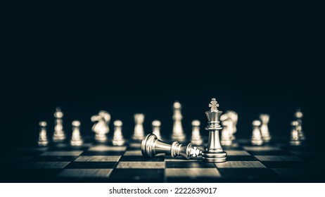 Close Up King Chess Pieces Stand With Falling Chess Concept Of Team Player Or Business Team And Leadership Strategy Or Strategic Planning And Human Resources Organization Risk Management.